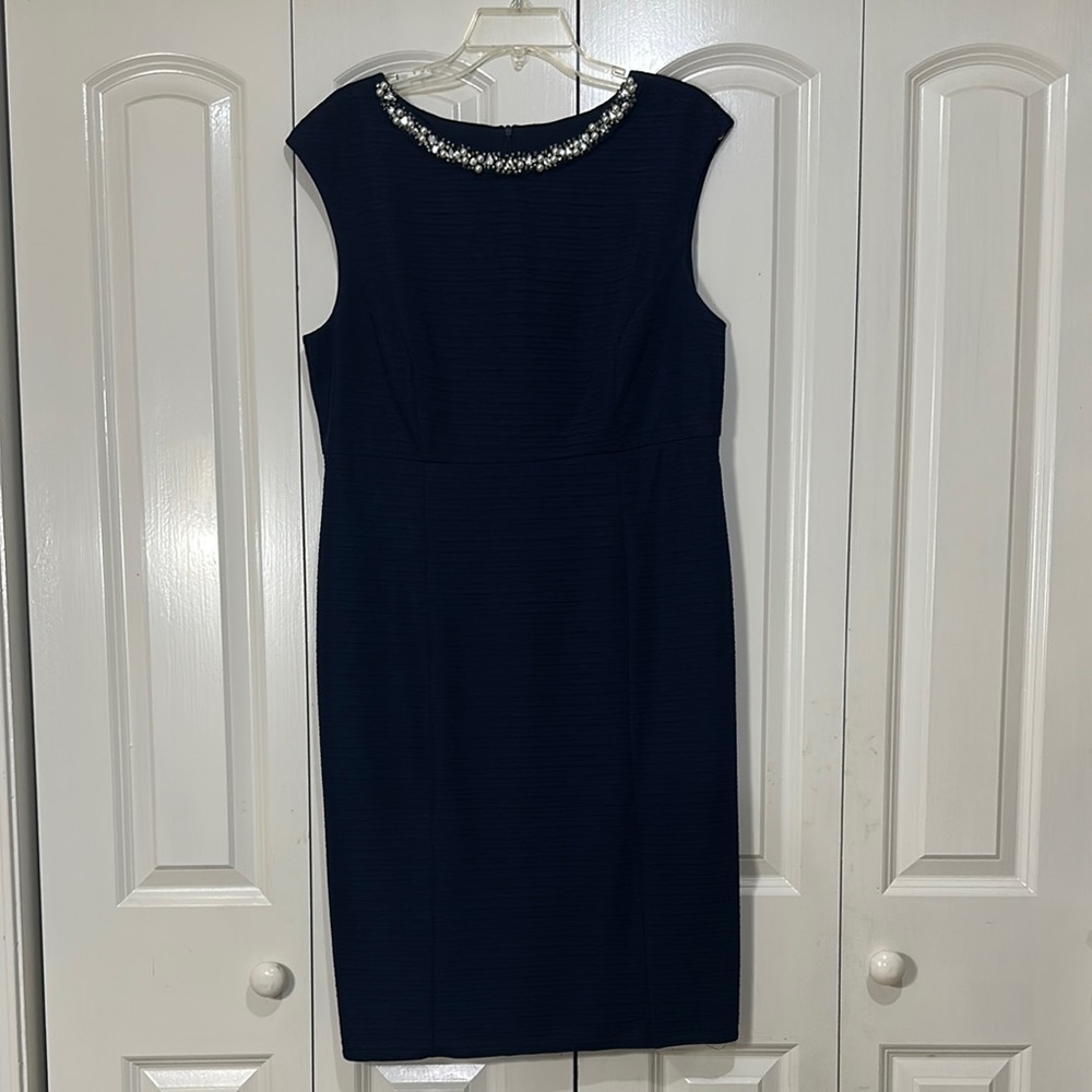 Elegant Navy Blue Dress with Embellished Neckline